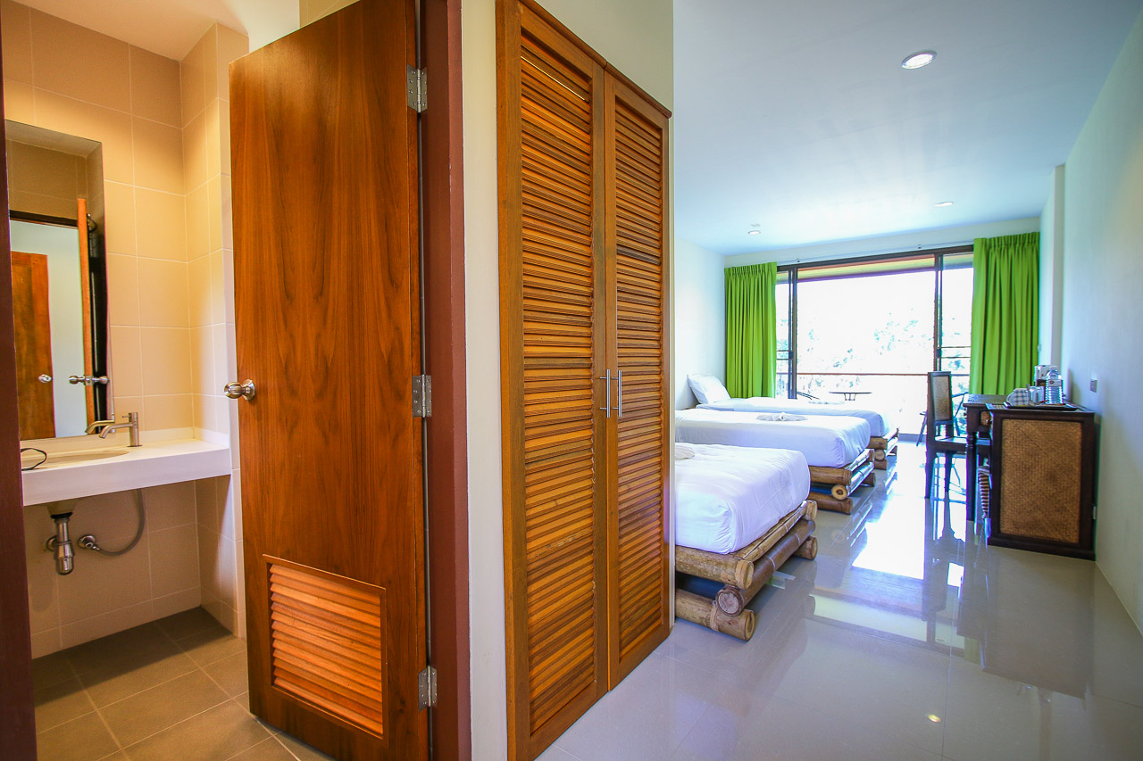 Standard rooms each have three single beds and balconies in new hotels.
